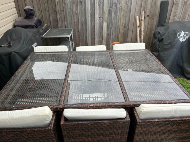 Large outdoor table with 6 chairs and all the cushions