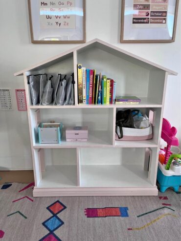 Free. Needs pick up asap. Extra large doll house, solid wood. Pink and white. Needs 2 people