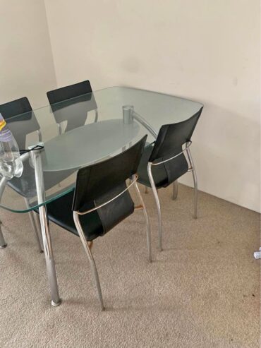 FREE 4 x black leather and chrome chairs